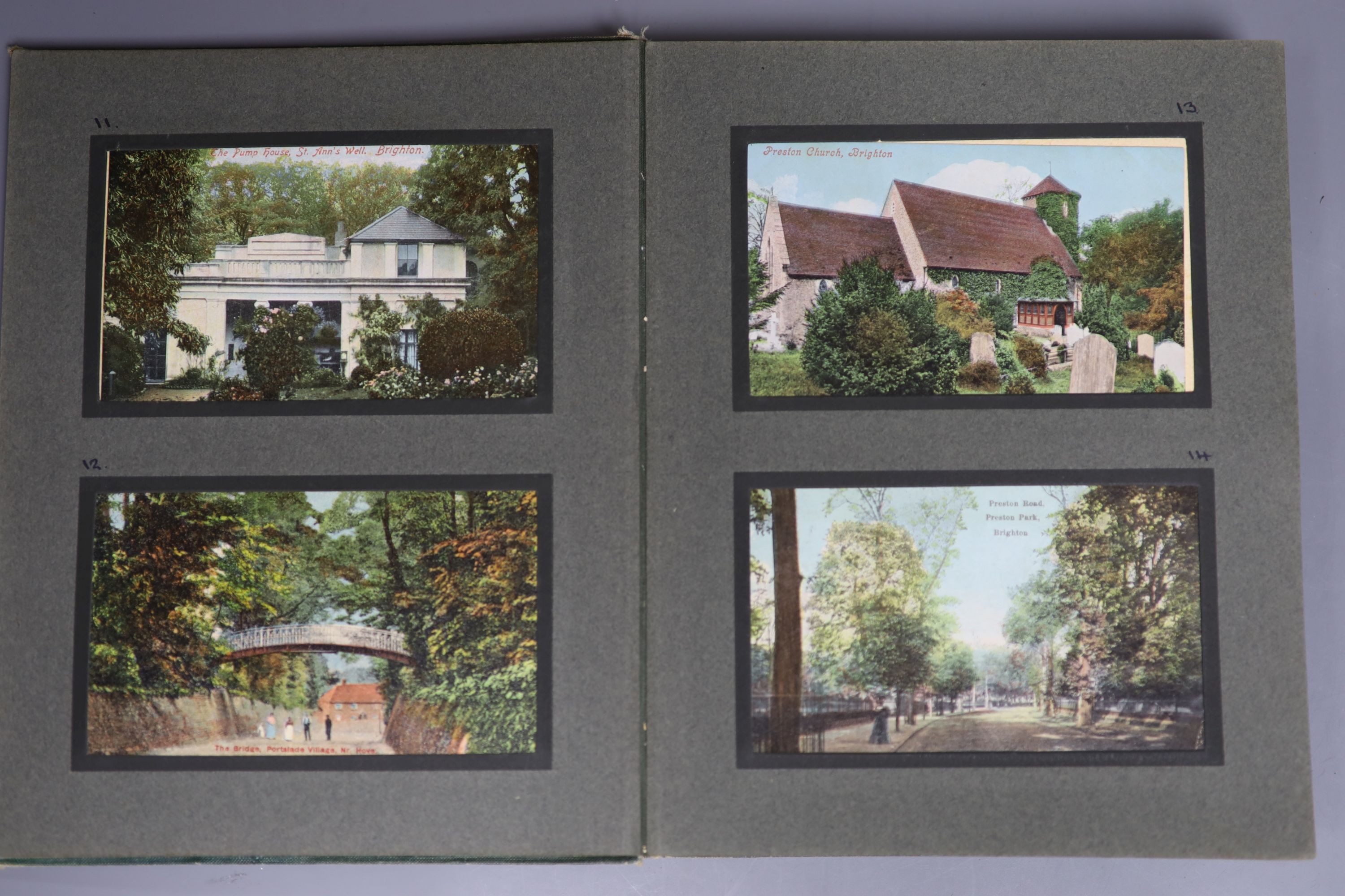 An album of Edwardian and later postcards, including Brighton and Sussex views